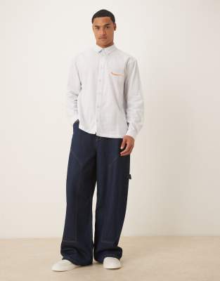 Asos Design Relaxed Shirt With Chest Embroidery In Yellow