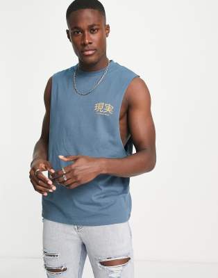 ASOS DESIGN relaxed singlet in dusty blue with text print