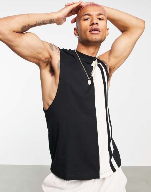 ASOS DESIGN relaxed singlet with cut & sew detail in black