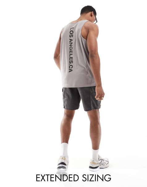 ASOS DESIGN relaxed singlet with scoop neck in grey with Los Angeles spine print - view 1