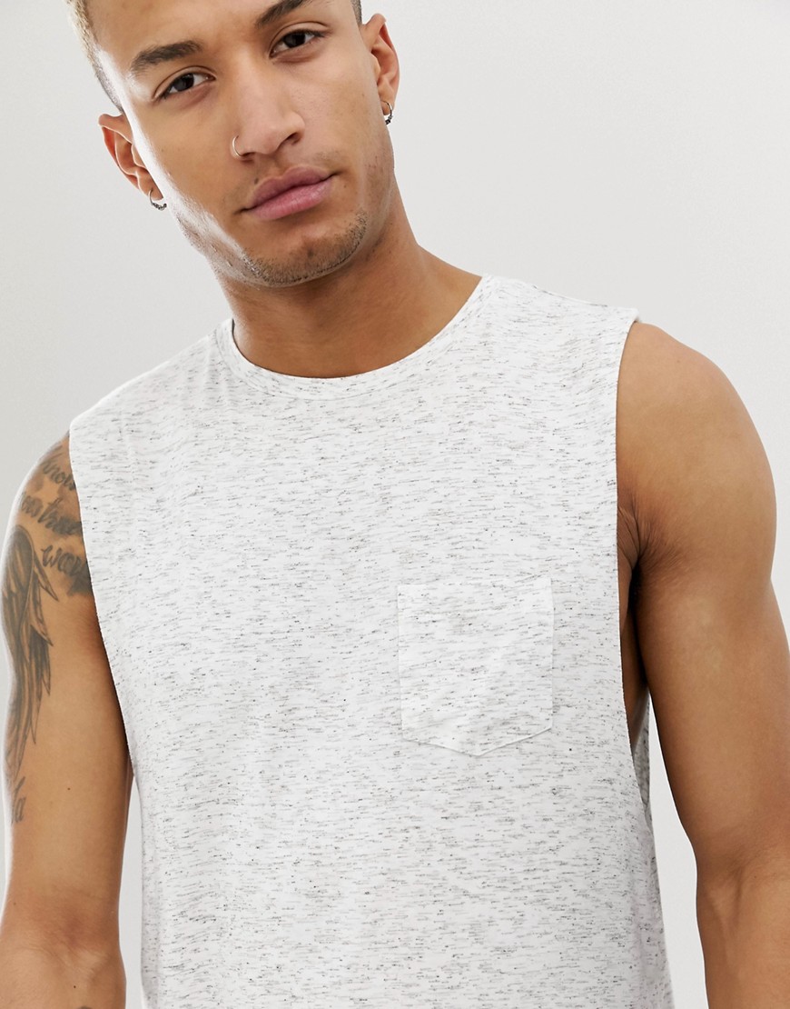 ASOS DESIGN relaxed sleeveless t-shirt with dropped armhole and pocket in interest fabric-White