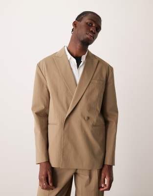 ASOS DESIGN relaxed slouchy double breasted suit jacket in khaki techy fabric-Green