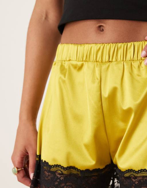 ASOS DESIGN relaxed stretch satin shorts in lime with black lace trim
