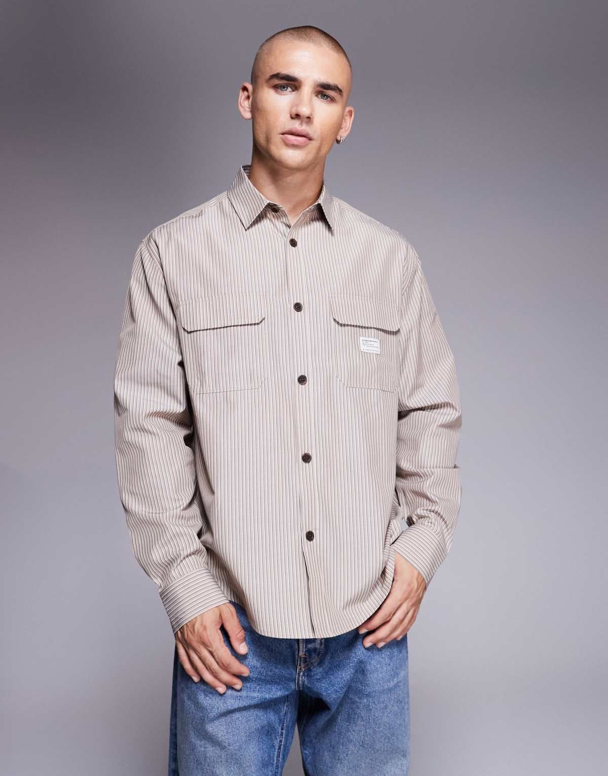ASOS DESIGN relaxed stripe shirt with workwear badge detail in brown stripe