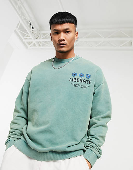 ASOS DESIGN relaxed sweatshirt in light green acid wash with liberate ...