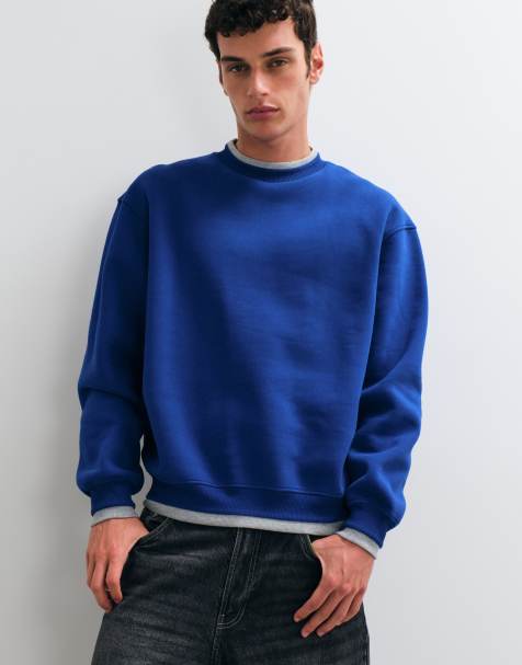 ASOS DESIGN relaxed sweatshirt met ronde hals en nep gelaagde ribbels in blauw polykatoen - view 1