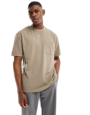 ASOS DESIGN relaxed t-shirt in brown with pocket detail