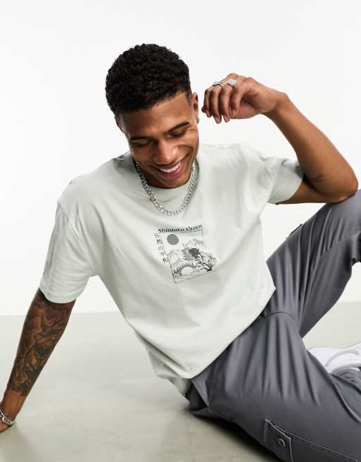 ASOS DESIGN relaxed t-shirt in light grey with souvenir chest print