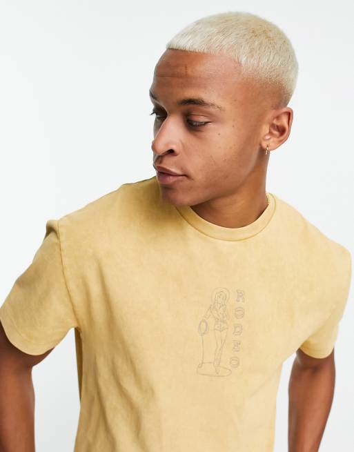 ASOS DESIGN relaxed t-shirt in washed yellow with cowgirl chest