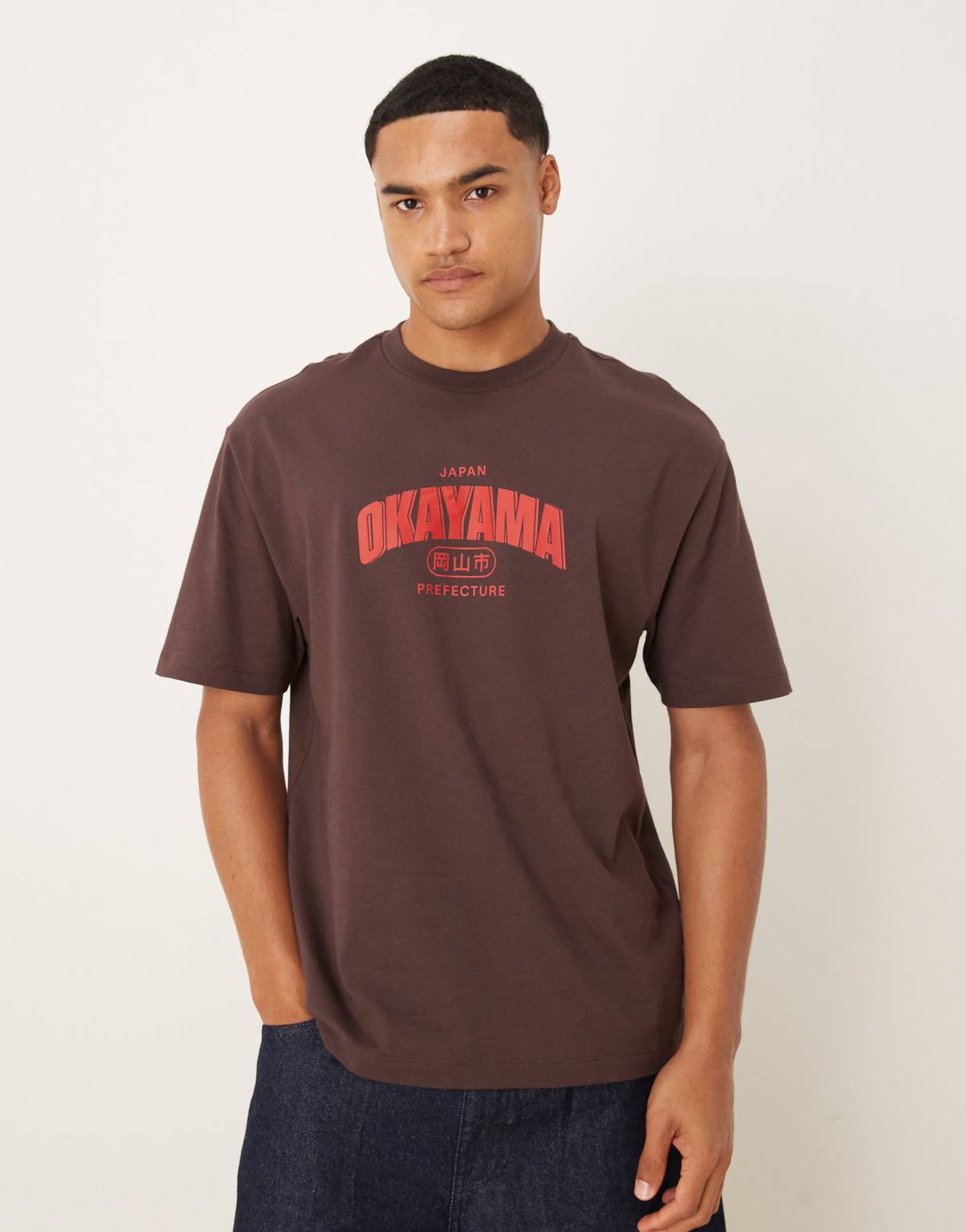 ASOS DESIGN relaxed t-shirt with city print in brown