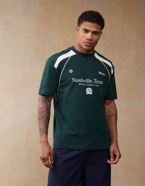 ASOS DESIGN relaxed t-shirt with cut and sew panelling and sports graphics in dark green - view 1