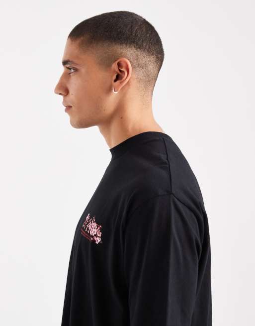 ASOS DESIGN relaxed t-shirt with floral chest graphic in black, 4 of 5
