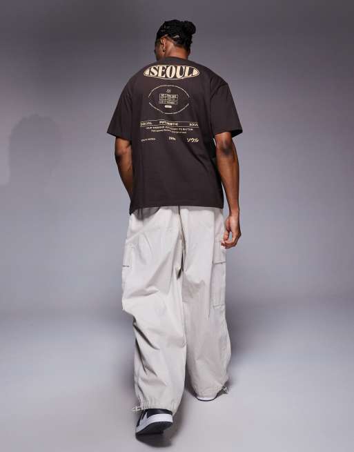 ASOS DESIGN relaxed T-shirt with Seoul graphic in dark brown