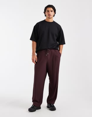 Asos Design Relaxed Taper Pleated Sweatpants In Purple