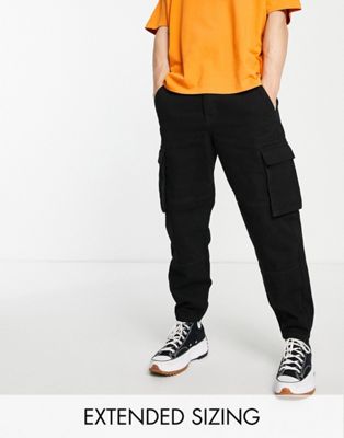 ASOS DESIGN relaxed tapered cargo jeans with carpenter detail in black - ASOS Price Checker
