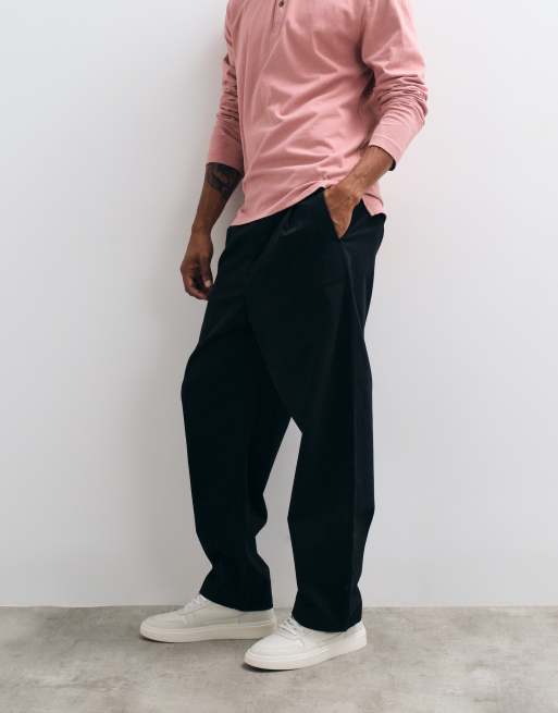 ASOS DESIGN relaxed tapered chino pants in black, 2 of 5