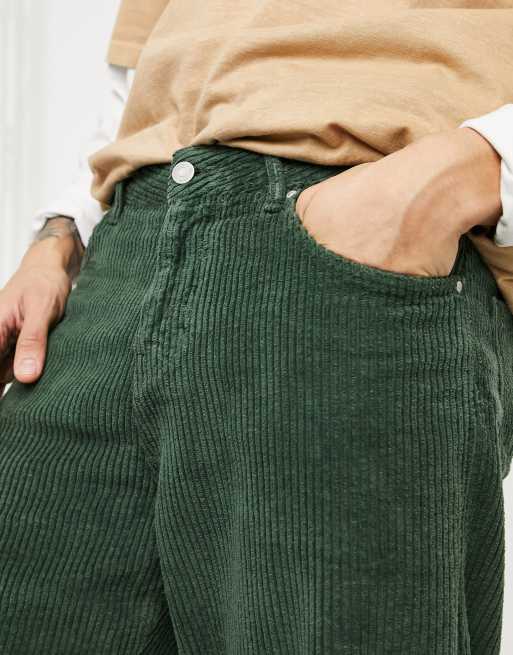 ASOS DESIGN relaxed cargo pants in dark green cord