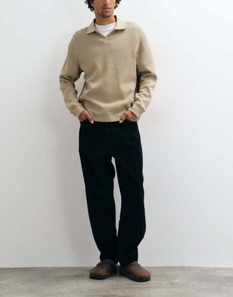 ASOS DESIGN relaxed tapered corduroy trousers in black - view 1