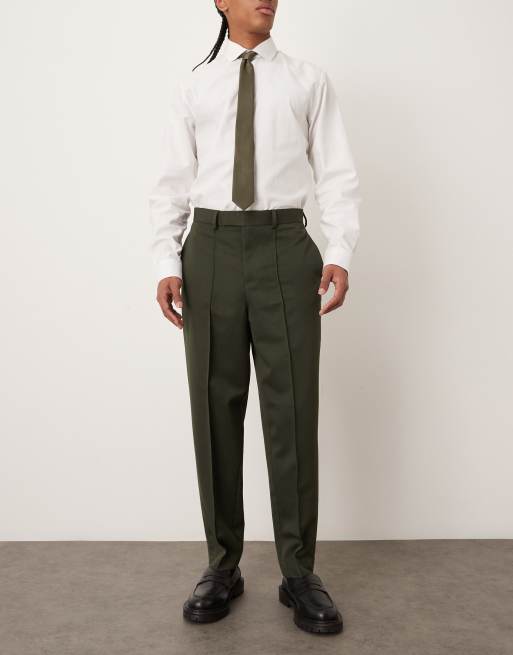 ASOS DESIGN relaxed tapered dress pants with pintucks in dark green, 2 of 5