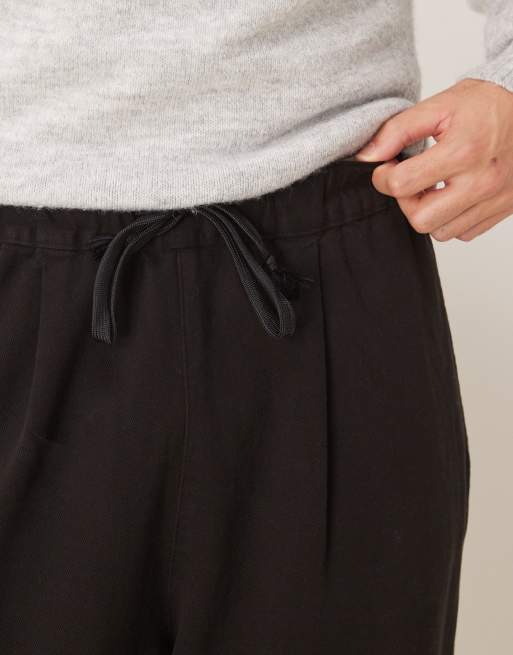 ASOS DESIGN relaxed tapered fit pull on pants in black, 5 of 5