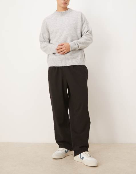 ASOS DESIGN relaxed tapered fit pull on trouser in black