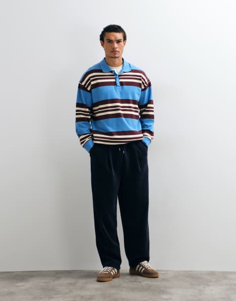 ASOS DESIGN relaxed tapered fleece jogger with pleats in navy - view 1