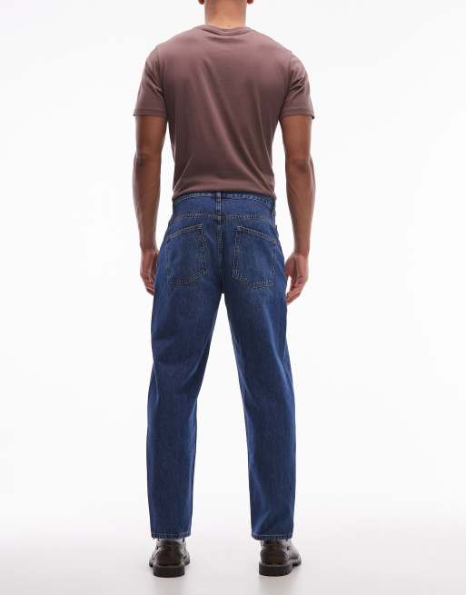 ASOS DESIGN relaxed tapered jeans in dark wash blue, 2 of 5
