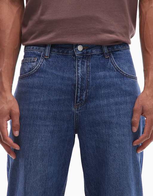 ASOS DESIGN relaxed tapered jeans in dark wash blue, 5 of 5