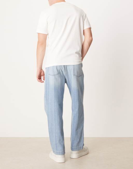ASOS DESIGN relaxed tapered jeans in light wash blue with stripe print