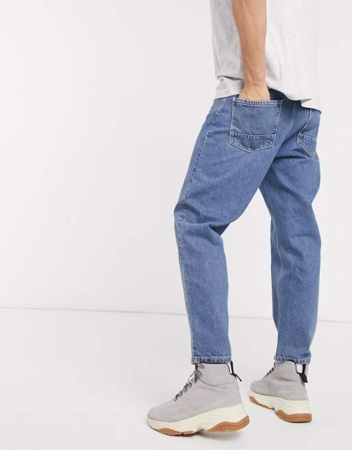 ASOS DESIGN relaxed tapered jeans in vintage mid wash