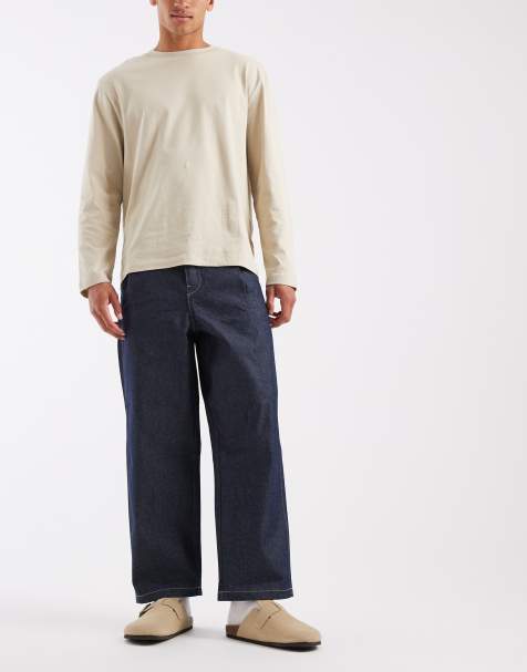ASOS DESIGN relaxed tapered jeans in raw denim with pleats and buckle - view 1