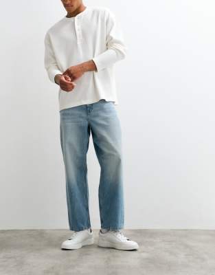 Непринужденные зауженные джинсы ASOS DESIGN в винтажном светло-голубом цвете light wash blue
