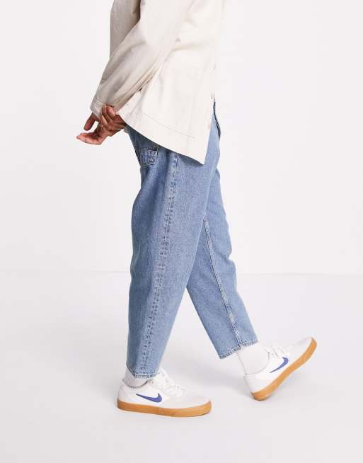 ASOS DESIGN relaxed tapered jeans in vintage mid wash blue ASOS