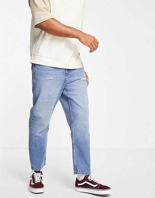 Relaxed tapered jeans in vintage mid blue Asos Men Clothing Jeans Tapered Jeans 