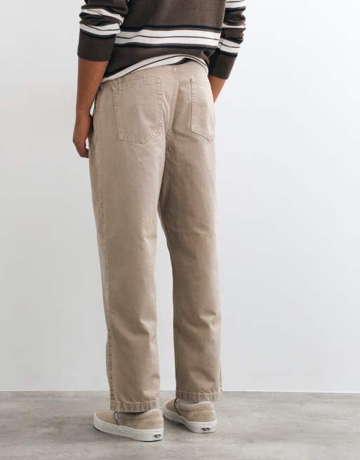 ASOS DESIGN relaxed tapered jeans in washed beige with pleats, 5 of 5