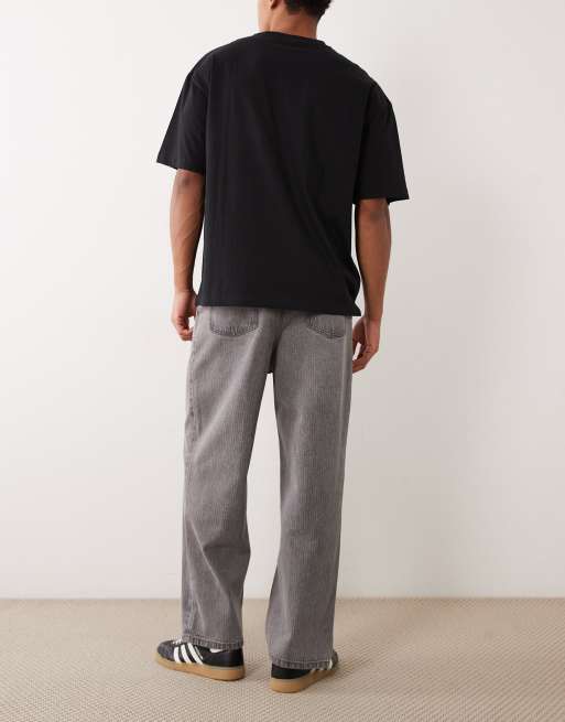 ASOS DESIGN relaxed tapered jeans in washed black with stripes, 2 of 5