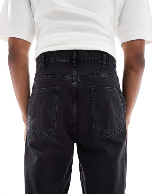 ASOS DESIGN relaxed tapered jeans in washed black