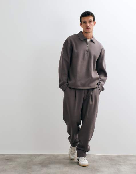 ASOS DESIGN relaxed tapered jogger with pleats in charcoal - view 1