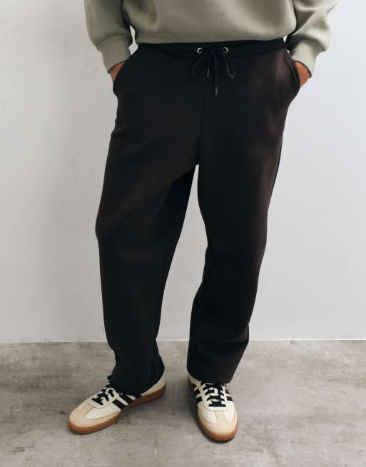 ASOS DESIGN relaxed tapered jogger with silver hardware detail in scuba-style fabric in torte, 4 of 5