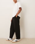 [ASOS DESIGN] ASOS DESIGN relaxed tapered pants in black W38 BLACK