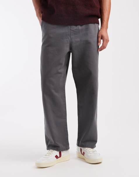 ASOS DESIGN relaxed tapered pants in washed black - view 1