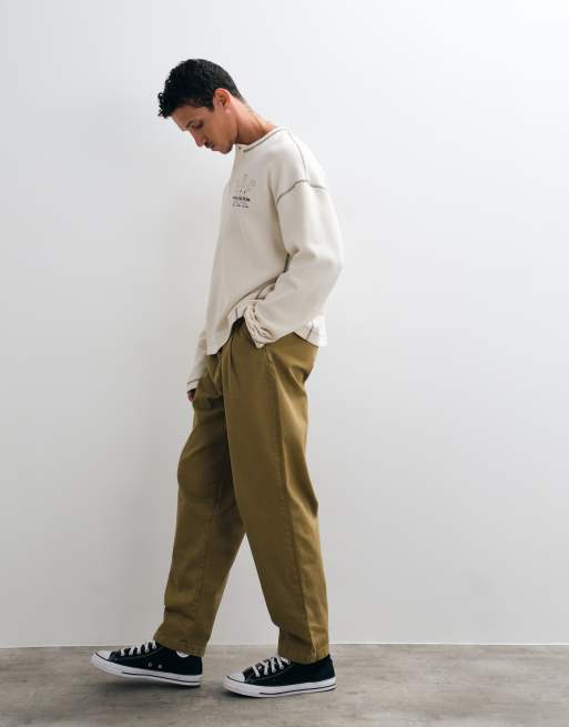 ASOS DESIGN relaxed tapered pants with belt and pleats in olive, 2 of 5