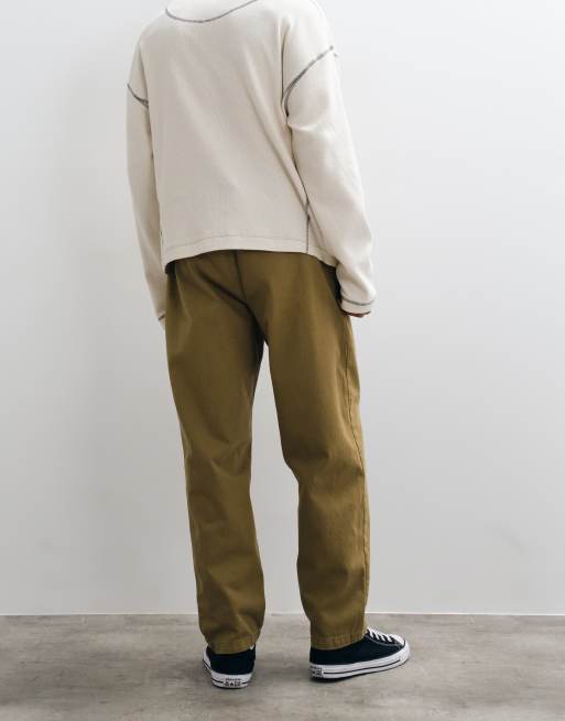 ASOS DESIGN relaxed tapered pants with belt and pleats in olive, 4 of 5
