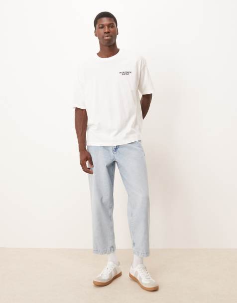 ASOS DESIGN relaxed tapered pleated jeans in bleach wash denim - view 1