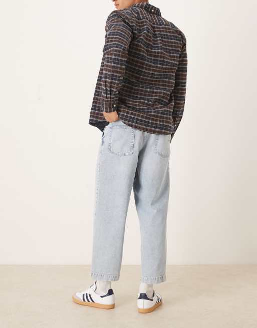 ASOS DESIGN relaxed tapered pleated jeans in bleach wash denim, 2 of 5