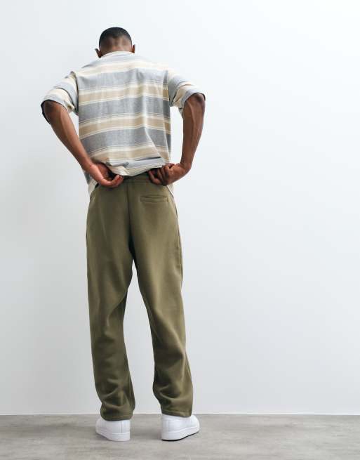ASOS DESIGN relaxed tapered pleated sweatpants in olive green, 2 of 5