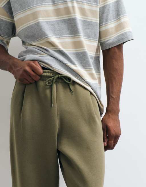 ASOS DESIGN relaxed tapered pleated sweatpants in olive green, 3 of 5