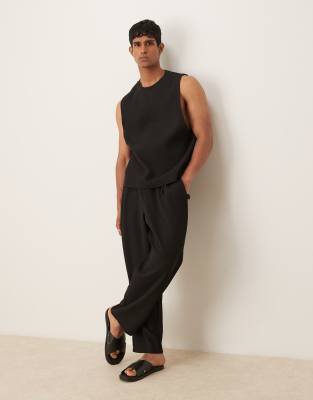 Asos Design Relaxed Tapered Plisse Sweatpants In Black