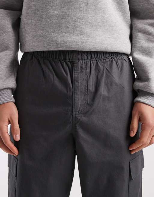 ASOS DESIGN relaxed tapered pull on cargo pants in black ripstop, 5 of 5
