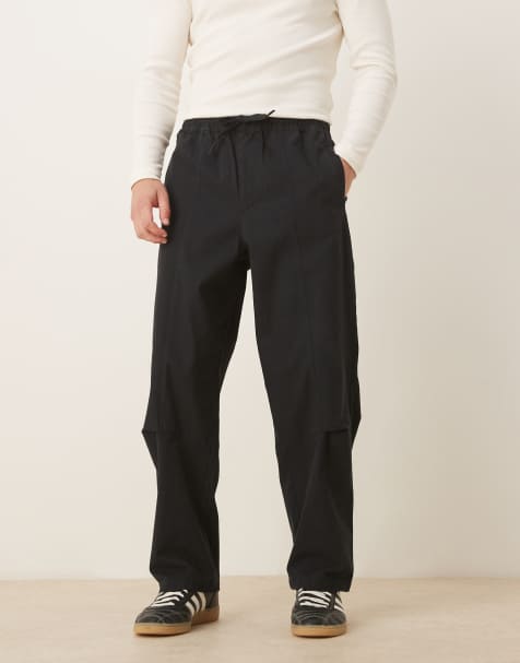 ASOS DESIGN relaxed tapered pull on trousers in black - view 1